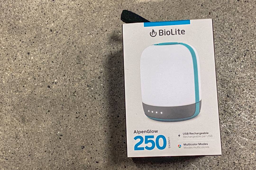 Box with a photo of a rounded lantern and the words "BioLite," "AlpenGlow 250 lumens," "USB Rechargeable," and "Multicolor Modes."